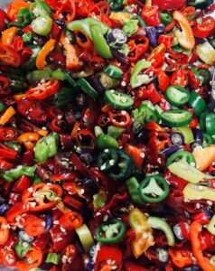 Sliced sweet and hot peppers.