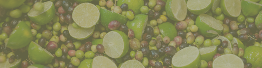 Co-milled olive oil olives mixed with limes as they go into the press to make Co-Milled Lime Olive Oil